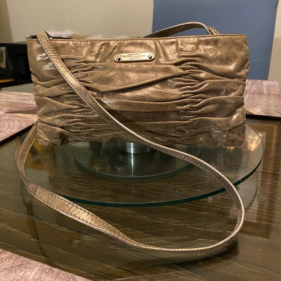 Michael Kors Handbags - Michael Kors Metallic Bronze Clutch